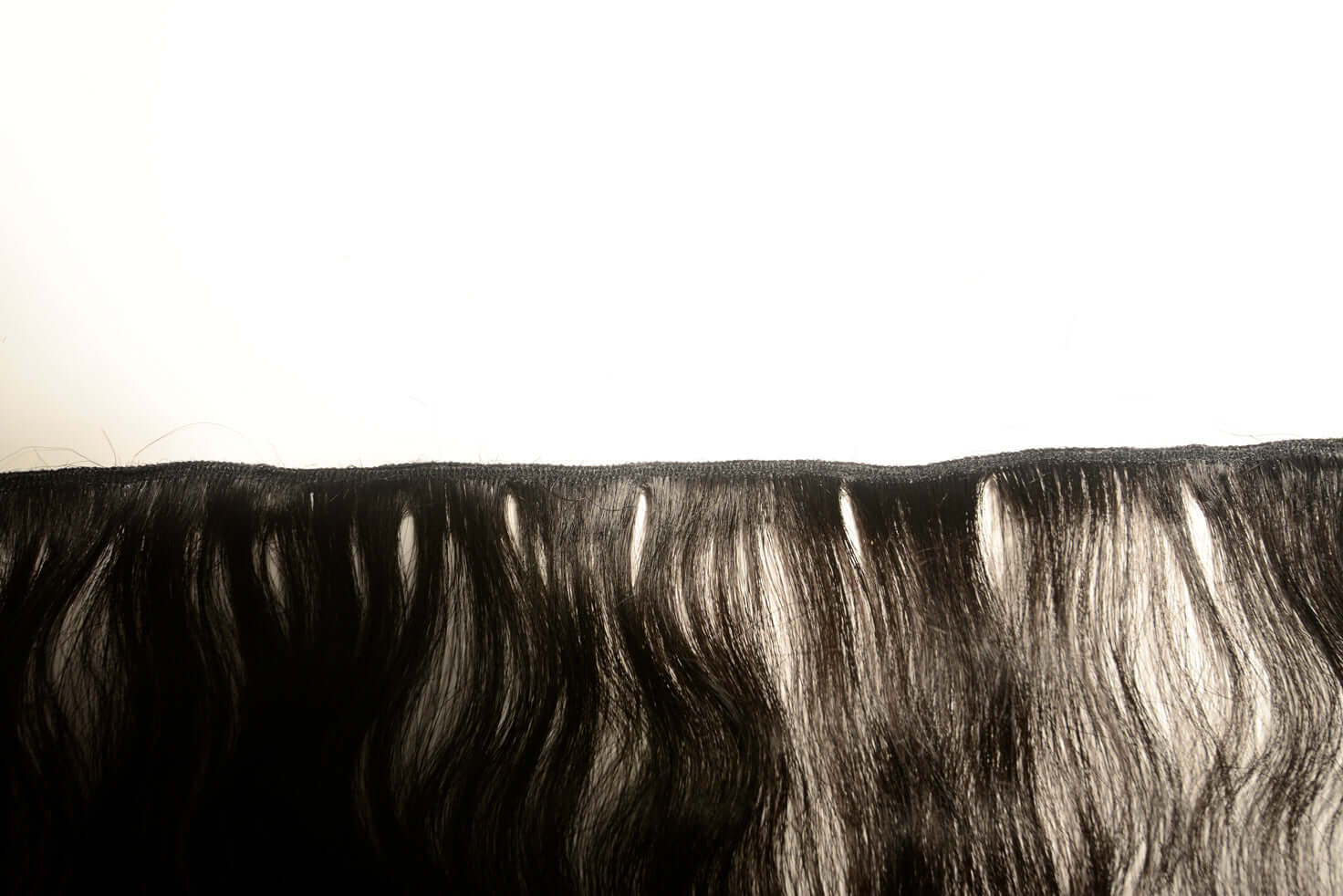 Close up of wefts on raw Indian hair Extensions for you to buy online