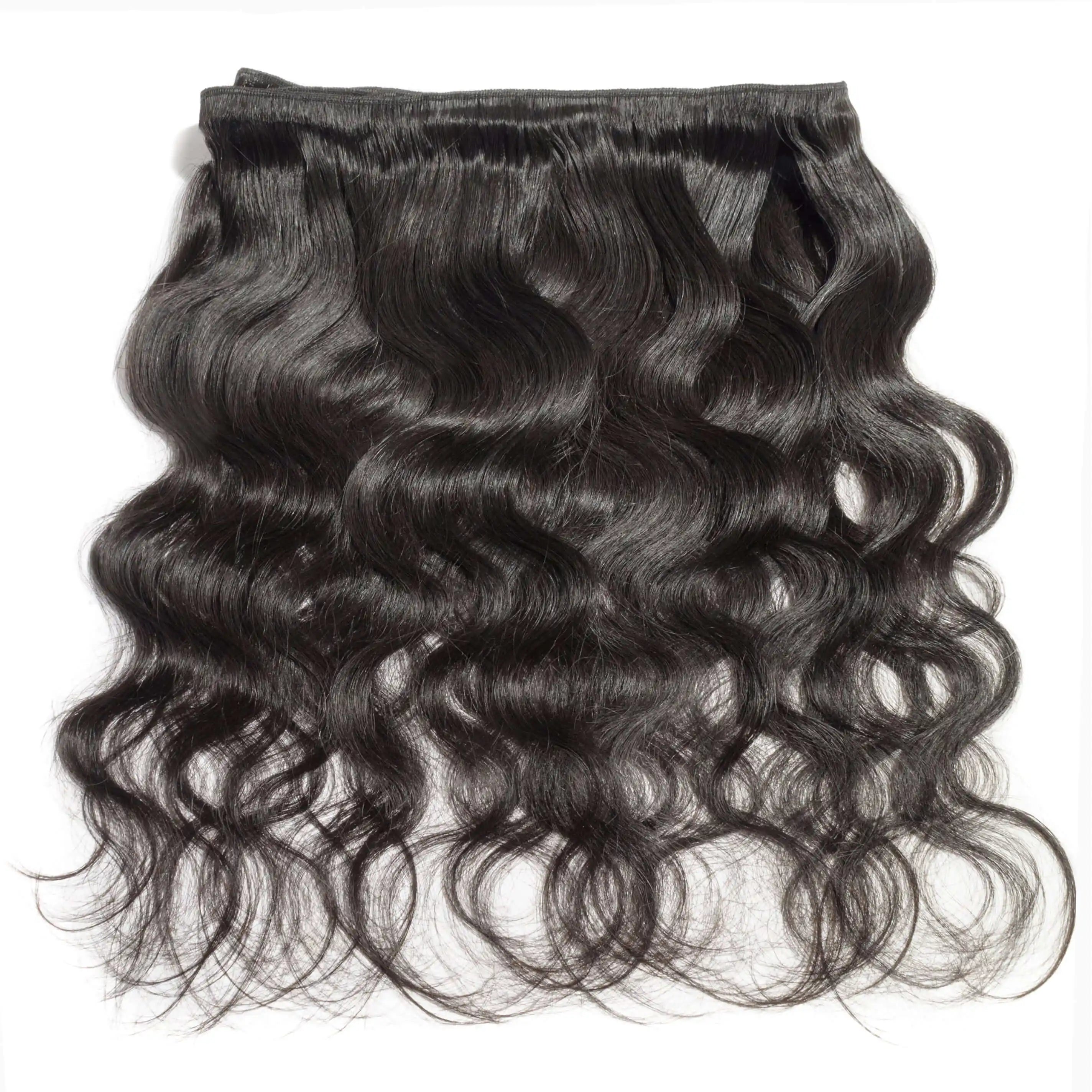 Raw Indian Hair Bundles featuring luxurious wavy texture, 100% unprocessed Human Hair, ideal for quality extensions.