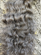 Close up of Loose Curly Raw Indian Hair