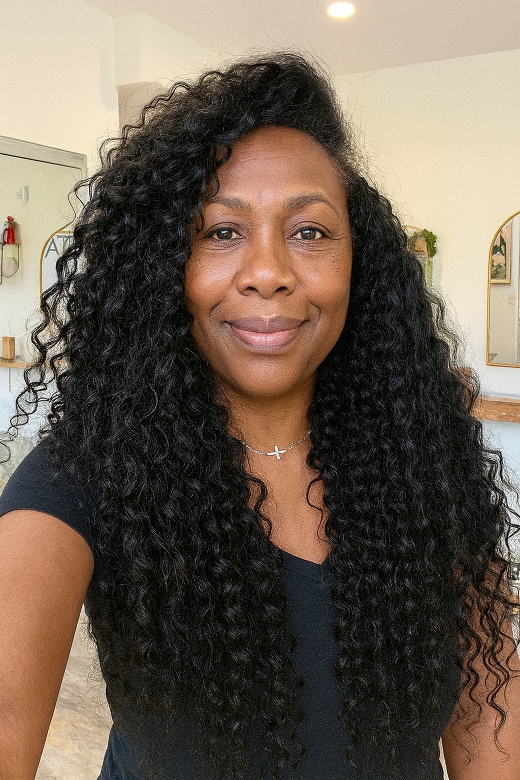 Lady wearing Raw Indian Curly Hair Extensions