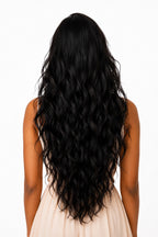 rear view of a model wearing 3 bundles of Biglove's Wavy raw Indian hair