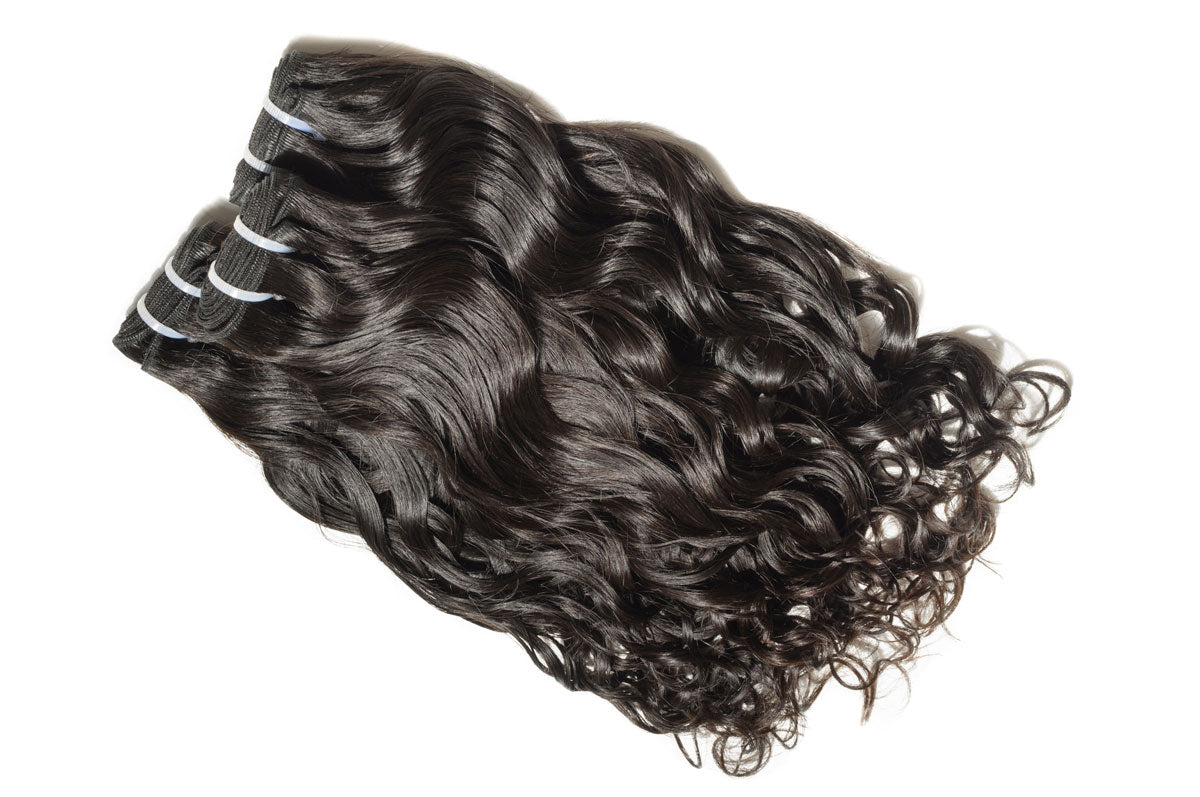 Complete BigLove wholesale sample kit featuring raw Indian hair in curly, wavy, and straight textures for quality testing and salon evaluation.