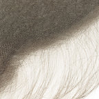 Close-up of an HD lace of a frontal from the BigLove wholesale kit, demonstrating the transparent, ultra-thin mesh that melts into all skin tones.