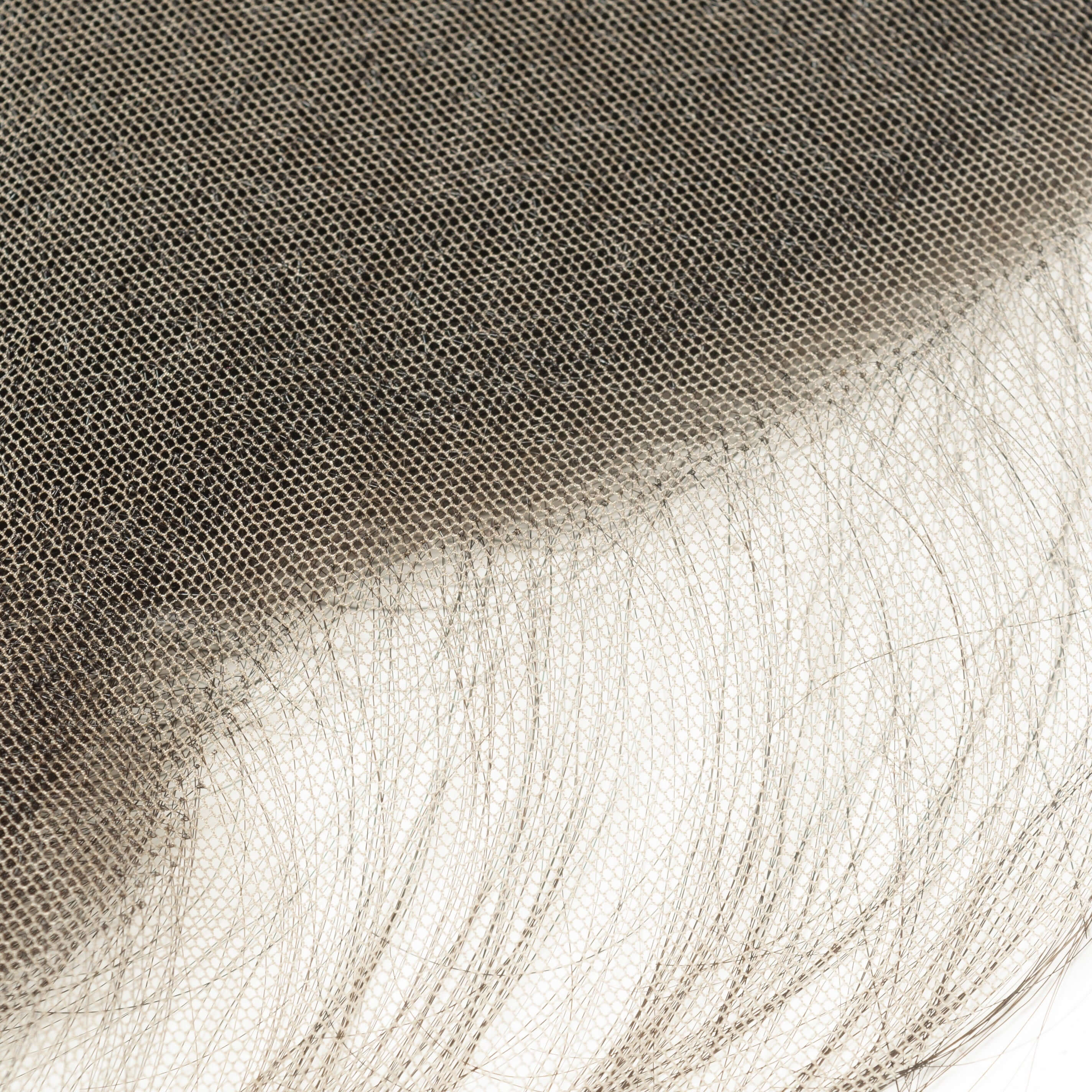 Close-up of an HD lace of a frontal from the BigLove wholesale kit, demonstrating the transparent, ultra-thin mesh that melts into all skin tones.
