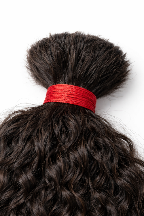 100 grams of premium Curly Raw Indian Bulk Hair from BigLove, ethically sourced and unprocessed for high-end braiding and luxury installs in the USA.