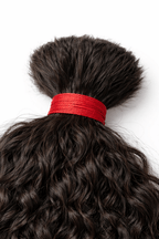 100 grams of premium Curly Raw Indian Bulk Hair from BigLove, ethically sourced and unprocessed for high-end braiding and luxury installs in the USA.