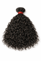 Premium curly raw Indian bulk hair for professional boho knotless braids, offering a tangle-free, long-lasting human hair braiding experience for US-based stylists.