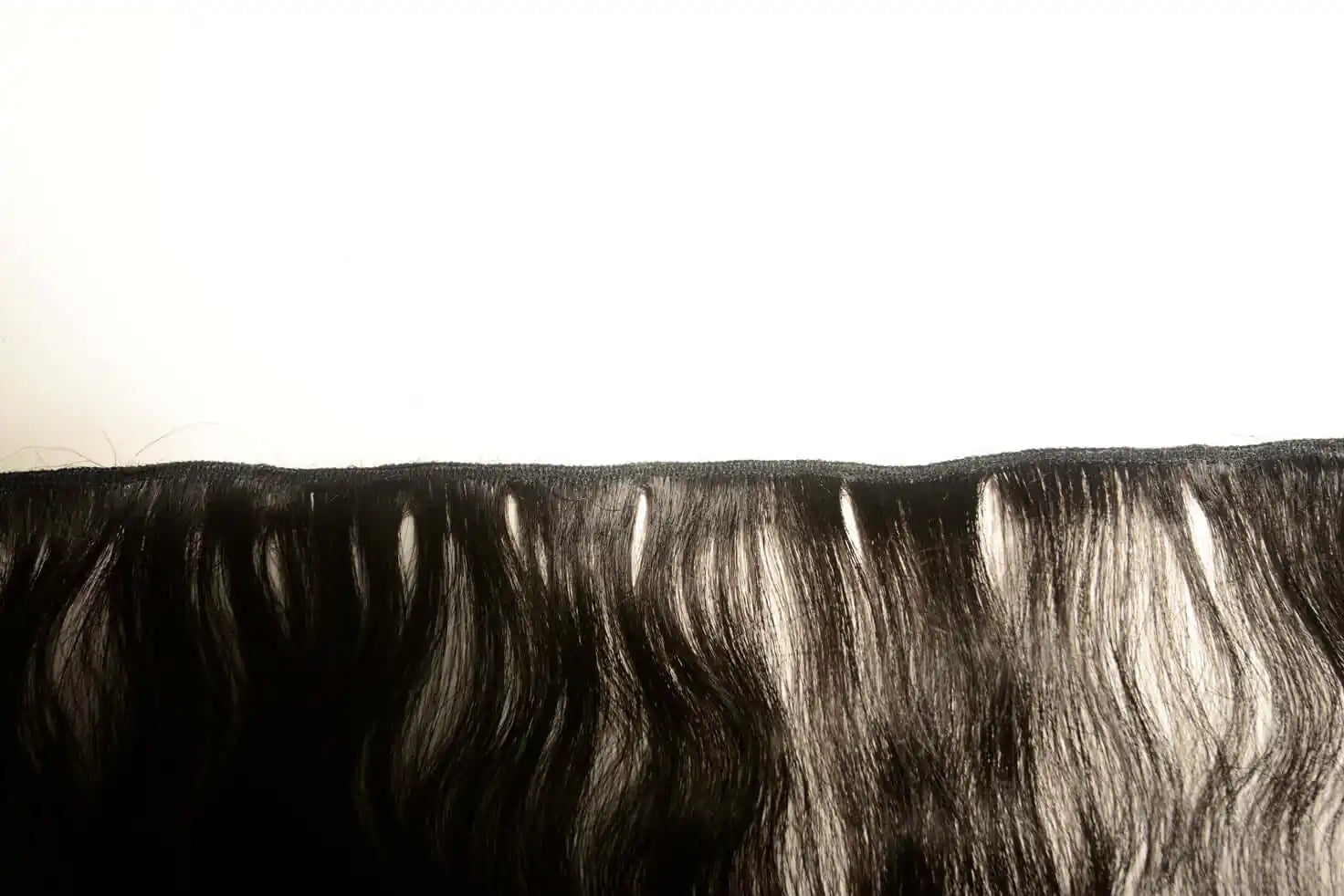 Close-up of BigLove Straight Raw Indian Hair, highlighting the natural high-shine luster and smooth, cuticle-aligned strands that prevent tangling.